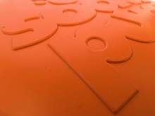 SP Bottle Top Flyer Durable Rubber Retrieving Frisbee - Orange Squeeze